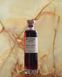 Bouteille de Distillerie Mezenk — Liqueur à l'alambic "Fruits des Bois" 50cl
